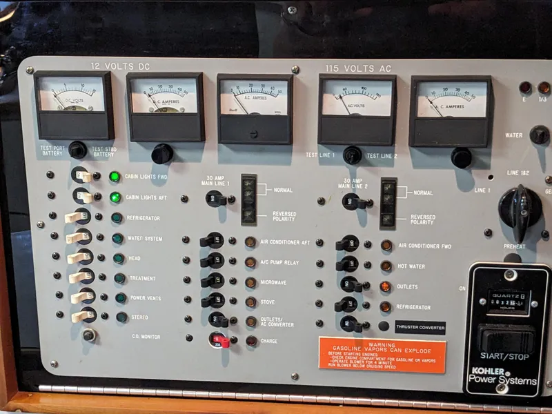 Slide: The Image of Control panel of a 1988 Sea Ray 390 Express Cruiser with Kohler power systems. - 24