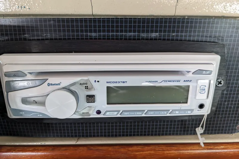 Slide: The Image of Audio system in a 1988 Sea Ray 390 Express Cruiser with Bluetooth and USB features. - 50