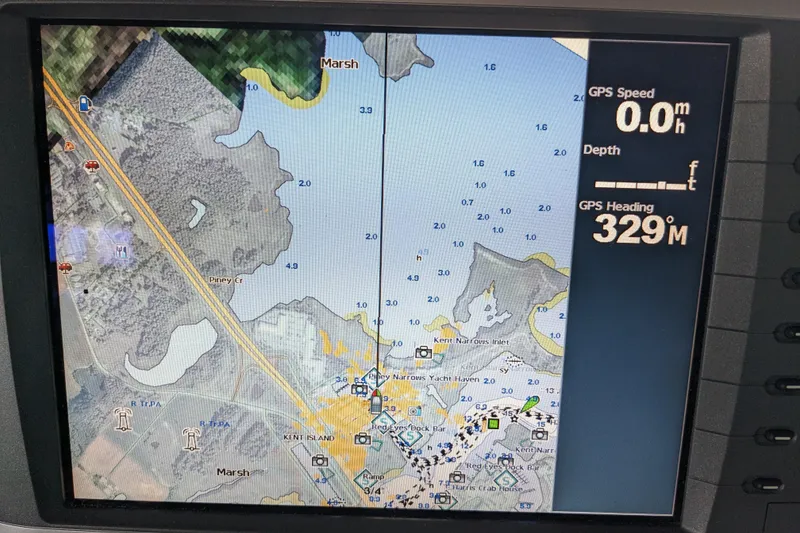 Slide: The Image of GPS navigation screen on a 1988 Sea Ray 390 Express Cruiser, showing map and heading. - 55