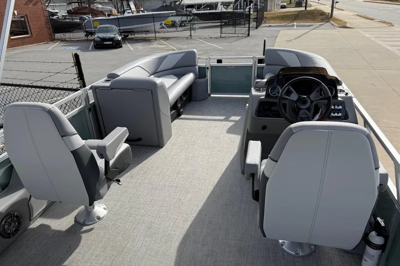 Slide: The Image of 2026 Avalon Venture 85 Versatile rear Bench interior with modern seating and steering console. - 16