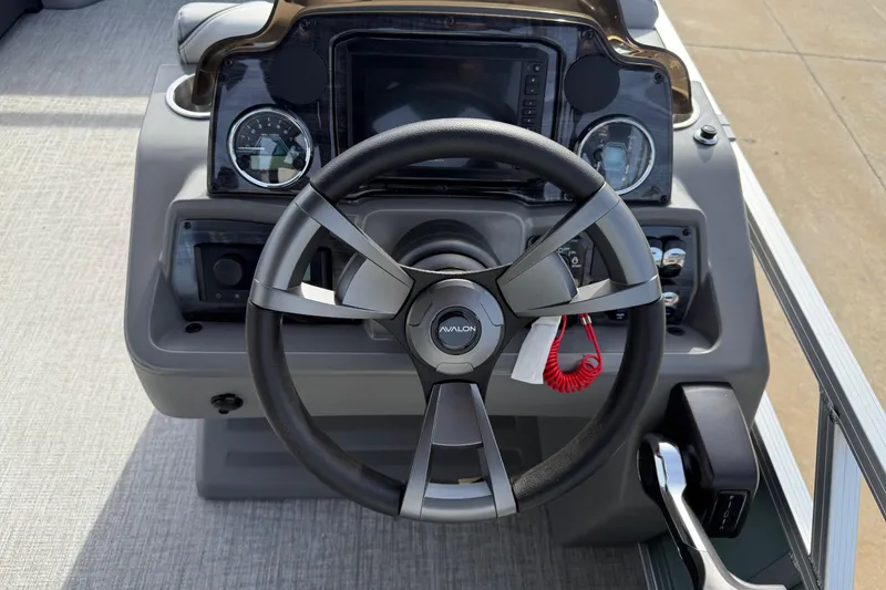 Slide: The Image of Steering console of 2026 Avalon Venture 85 Versatile Rear Bench boat. - 23