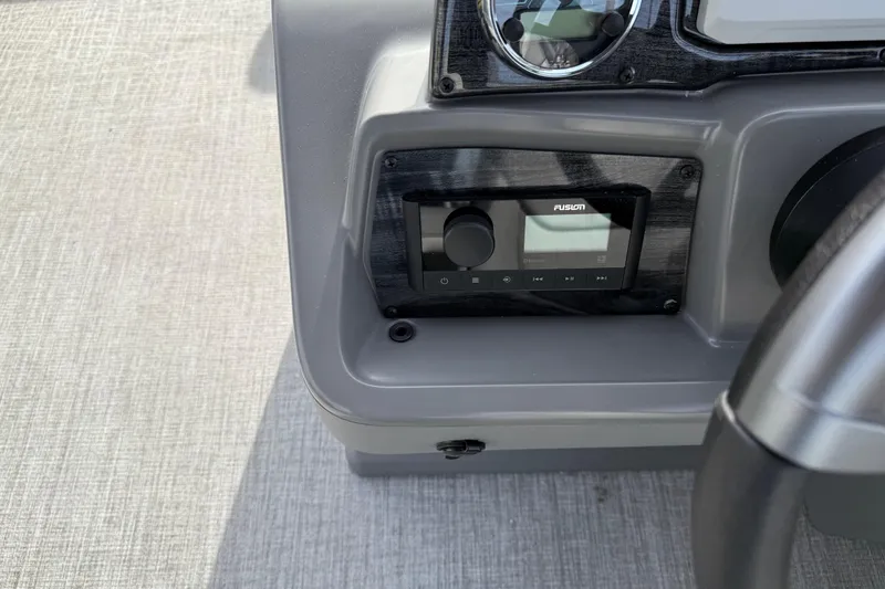 Slide: The Image of Control panel of 2026 Avalon Venture 85 Versatile rear Bench boat. - 27