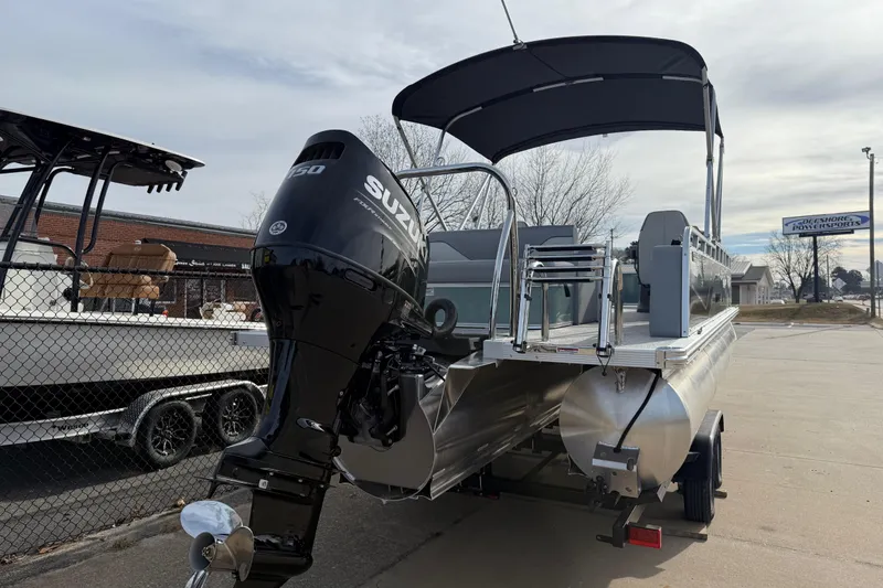 Slide: The Image of 2026 Avalon Venture 85 Versatile rear Bench pontoon boat with Suzuki outboard motor. - 4