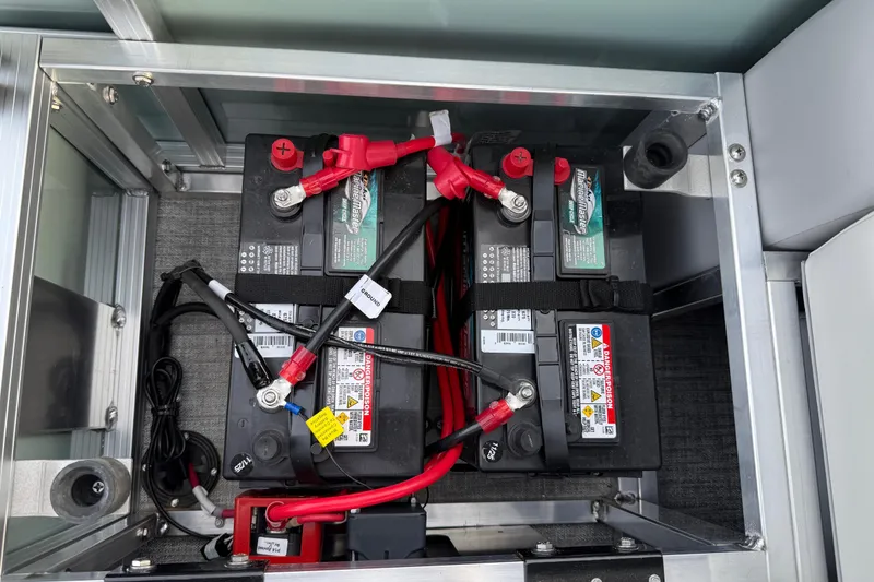 Slide: The Image of Battery compartment of 2026 Avalon Venture 85 Versatile rear Bench with wiring connections. - 40