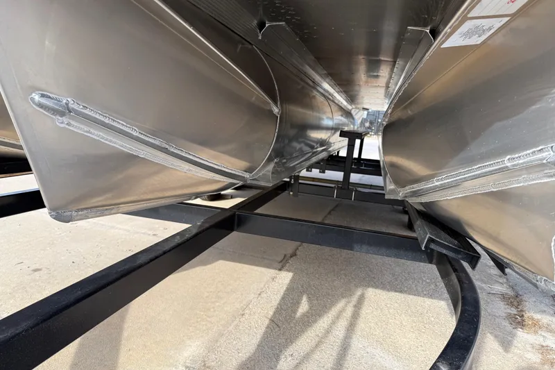 Slide: The Image of Underneath view of 2026 Avalon Venture 85 Versatile rear Bench pontoon boat on trailer. - 41