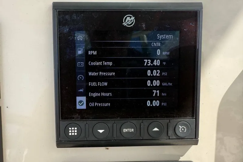 Slide: The Image of 2024 Boston Whaler 250 Dauntless boat stern with trim tabs and motor mount. - 10