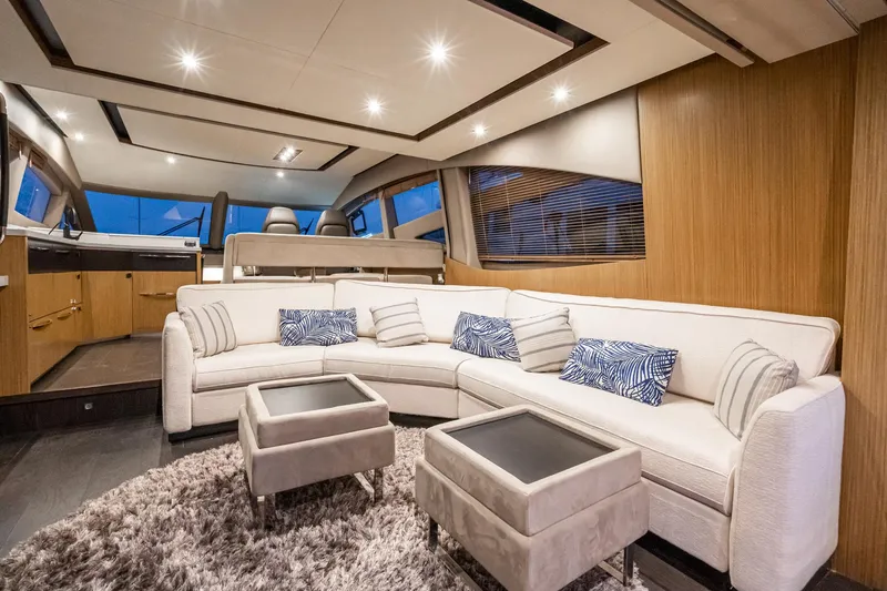 Slide: The Image of Luxurious interior of 2018 Sea Ray L590 Fly yacht with modern furnishings. - 29