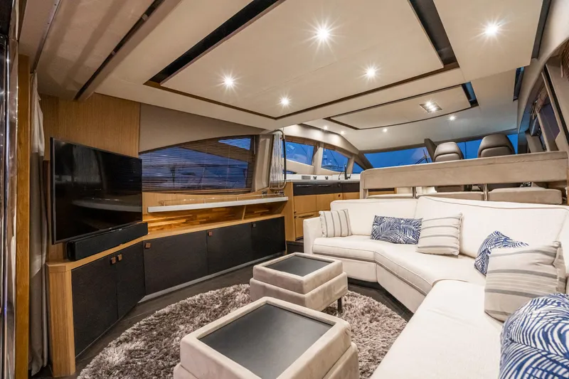 Slide: The Image of Luxurious interior of 2018 Sea Ray L590 Fly yacht with modern furnishings and ambient lighting. - 30