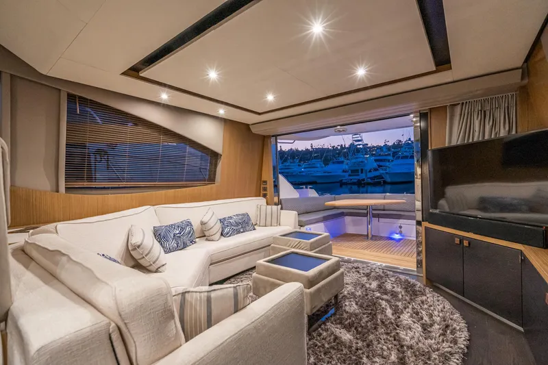Slide: The Image of Luxurious interior of 2018 Sea Ray L590 Fly yacht with plush seating and modern decor. - 34