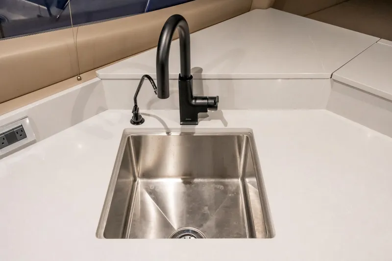 Slide: The Image of Modern kitchen sink on 2018 Sea Ray L590 Fly yacht. - 40