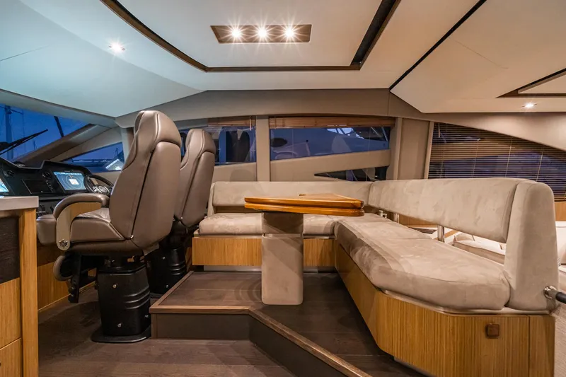 Slide: The Image of Luxurious interior of 2018 Sea Ray L590 Fly yacht with plush seating and modern design. - 45