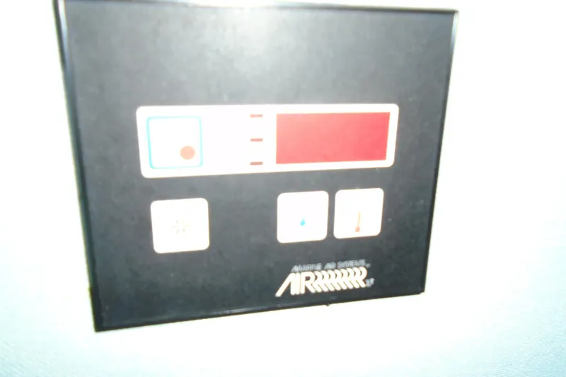 Slide: The Image of Control panel of a 1989 Sea Ray 300 Weekender boat. - 17