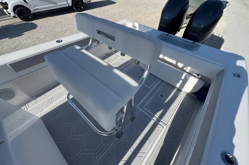 Slide: The Image of 2021 Contender 28 Tournament boat interior with seating and dual engines. - 5