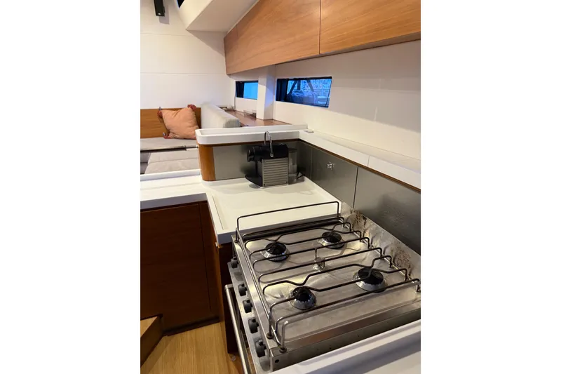 Slide: The Image of Modern kitchen interior of 2020 Amel 50 yacht with stove and seating area. - 17