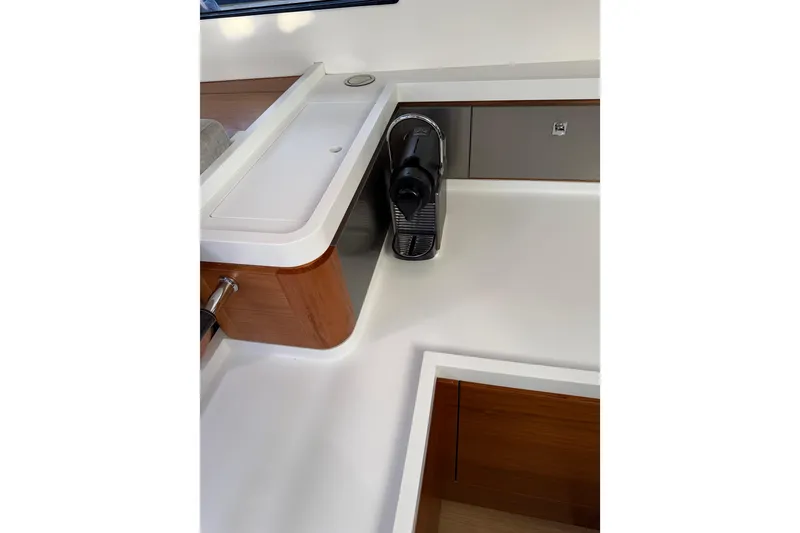 Slide: The Image of Modern kitchen area in 2020 Amel 50 yacht with coffee machine. - 18