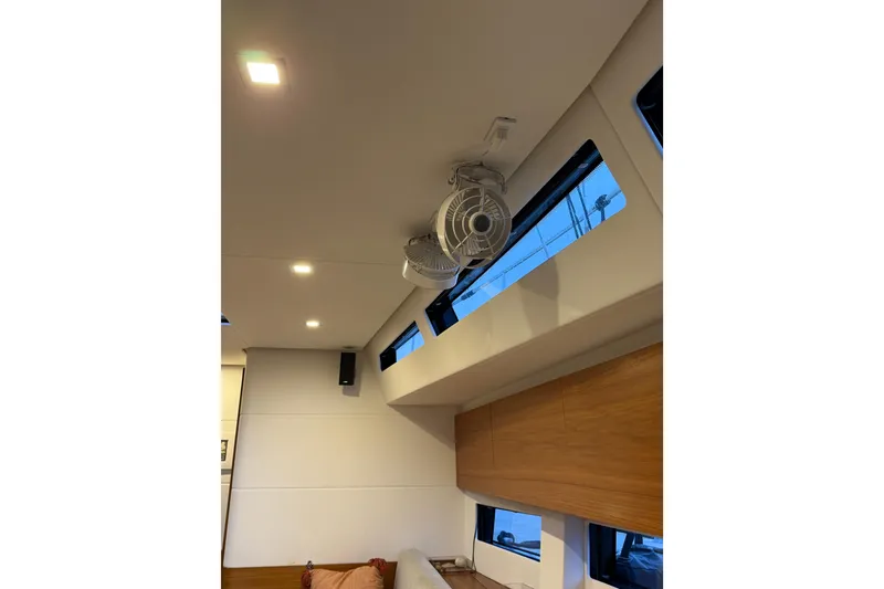 Slide: The Image of Interior of 2020 Amel 50 yacht with ceiling fan and modern lighting. - 22