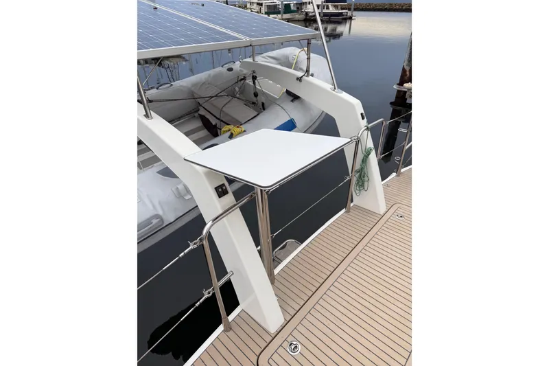 Slide: The Image of Amel 50 yacht deck with solar panels and dinghy, 2020 model. - 36