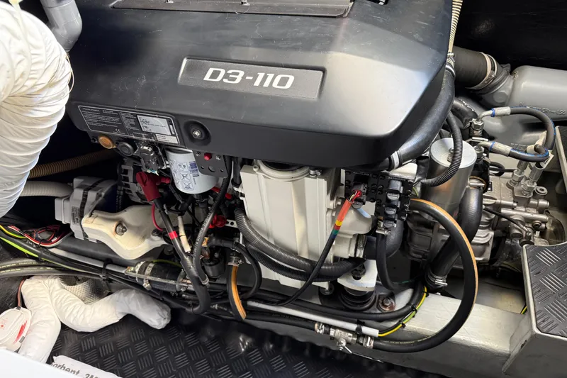 Slide: The Image of Engine compartment of a 2020 Amel 50 yacht featuring a D3-110 engine. - 53