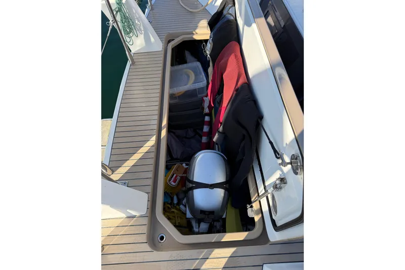 Slide: The Image of Storage compartment on 2020 Amel 50 yacht deck, containing various boating equipment. - 59
