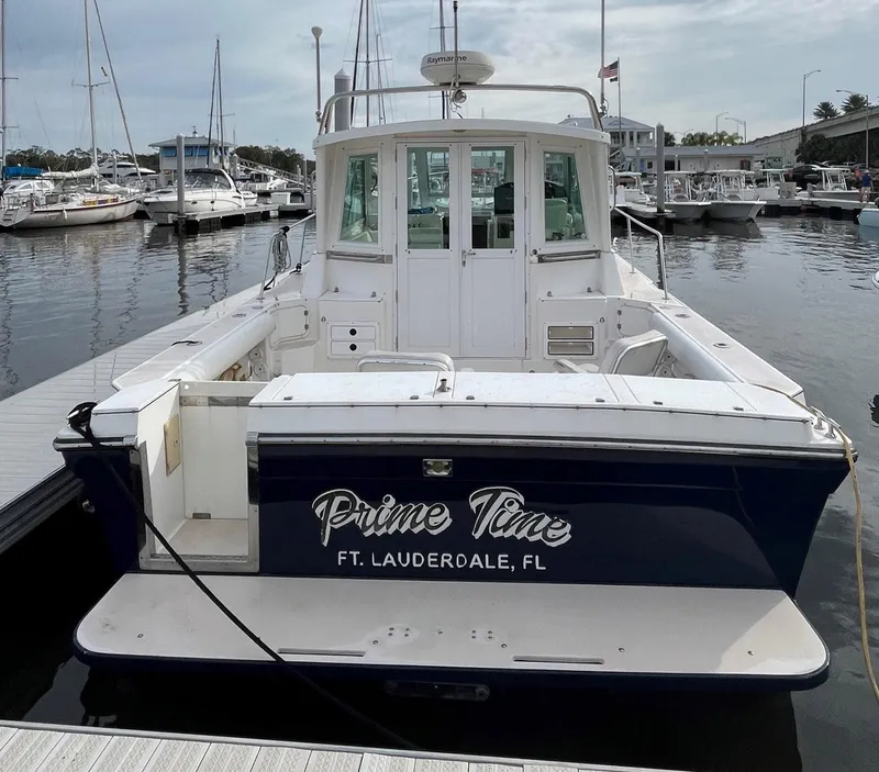 Slide: The Image of 2005 Albin 31 Tournament Express boat docked in marina, named "Prime Time," Ft. Lauderdale, FL. - 25