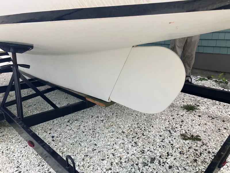 Slide: The Image of Underside of a 1995 Edey & Duff Stuart Knockabout boat on a trailer. - 12