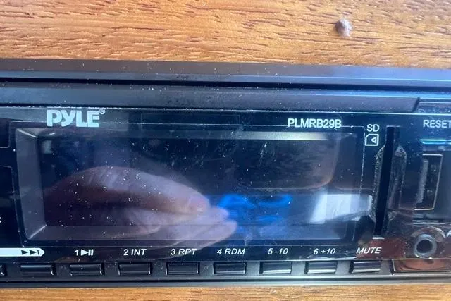 Slide: The Image of Pyle PLMRB29B stereo system in a 1977 Tartan 37 boat interior. - 13