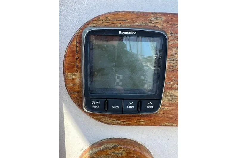Slide: The Image of Raymarine display on 1977 Tartan 37 sailboat, mounted on wooden panel. - 7