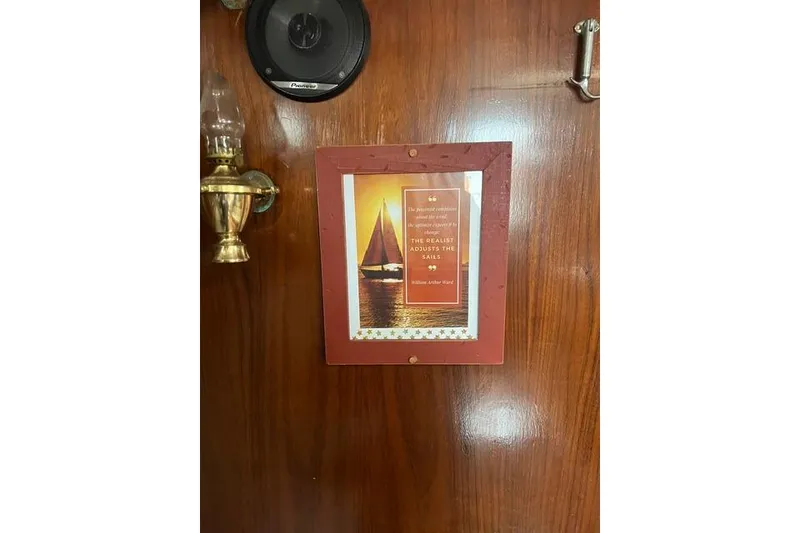 Slide: The Image of Framed sailboat quote on wooden wall, Tartan 37, 1977 interior decor. - 8