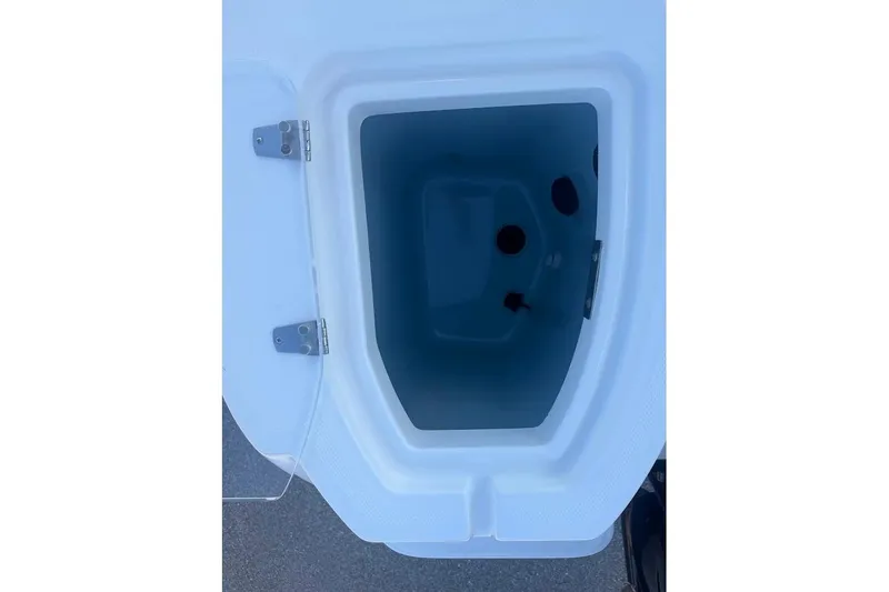 Slide: The Image of Open storage compartment on a 2017 Boston Whaler 285 Conquest boat. - 52