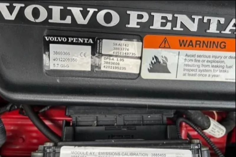 Slide: The Image of Volvo Penta engine label on 2007 Four Winns 338 Vista, featuring warning and specifications. - 26