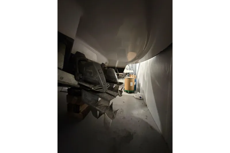 Slide: The Image of 2007 Four Winns 338 Vista boat propeller and hull in storage. - 27
