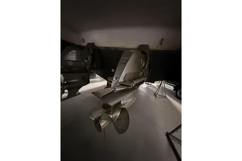 Slide: The Image of 2007 Four Winns 338 Vista boat propeller in storage, showcasing its sleek design. - 28