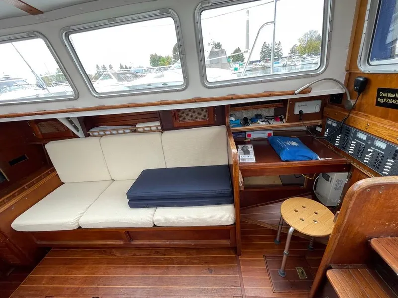 Slide: The Image of Interior of a 1977 Islander Yachts Freeport 36 with wooden furnishings. - 5