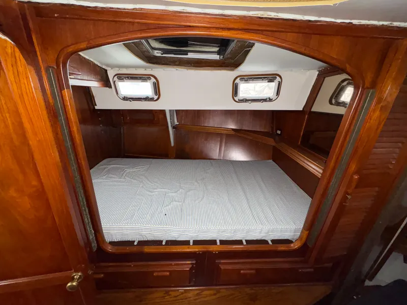 Slide: The Image of Interior of a 1977 Islander Yachts Freeport 36 with wooden finish. - 8