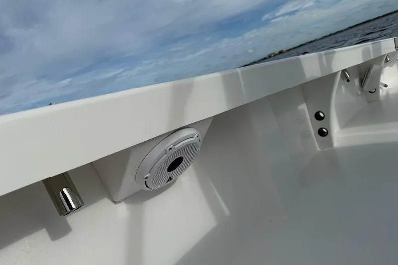 Slide: The Image of 2023 T Craft 27 boat interior with speaker and ocean view. - 19