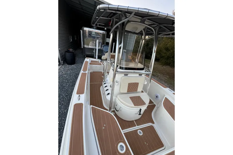 Slide: The Image of 2011 Hydra-Sports Bay Bolt 23 boat with sleek deck design and modern seating. - 13