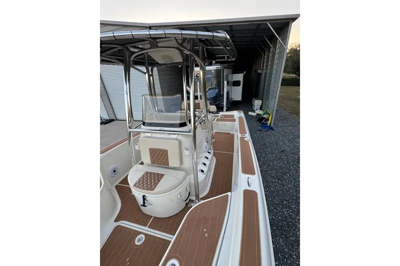 Slide: The Image of 2011 Hydra-Sports Bay Bolt 23 boat with sleek interior and seating. - 15