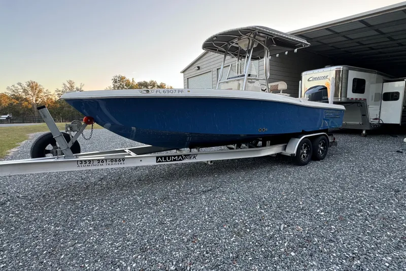 Slide: The Image of 2011 Hydra-Sports Bay Bolt 23 boat on trailer, parked outdoors. - 3