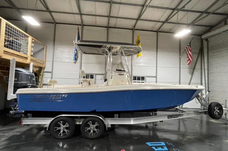 Slide: The Image of 2011 Hydra-Sports Bay Bolt 23 boat on trailer in a garage setting. - 4