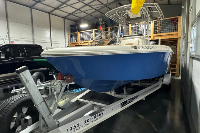 Slide: The Image of 2011 Hydra-Sports Bay Bolt 23 boat on trailer in a garage. - 8