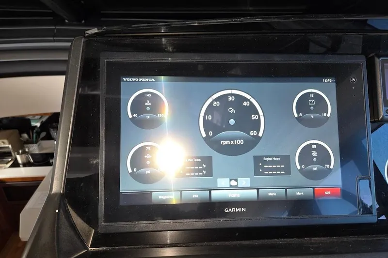 Slide: The Image of Garmin display on 2019 Sunseeker Predator 50 yacht showing engine metrics. - 18
