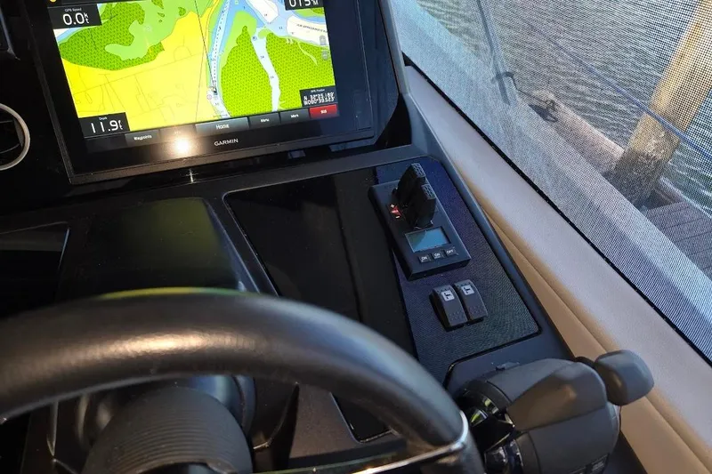 Slide: The Image of Control panel of a 2019 Sunseeker Predator 50 yacht with navigation display. - 21