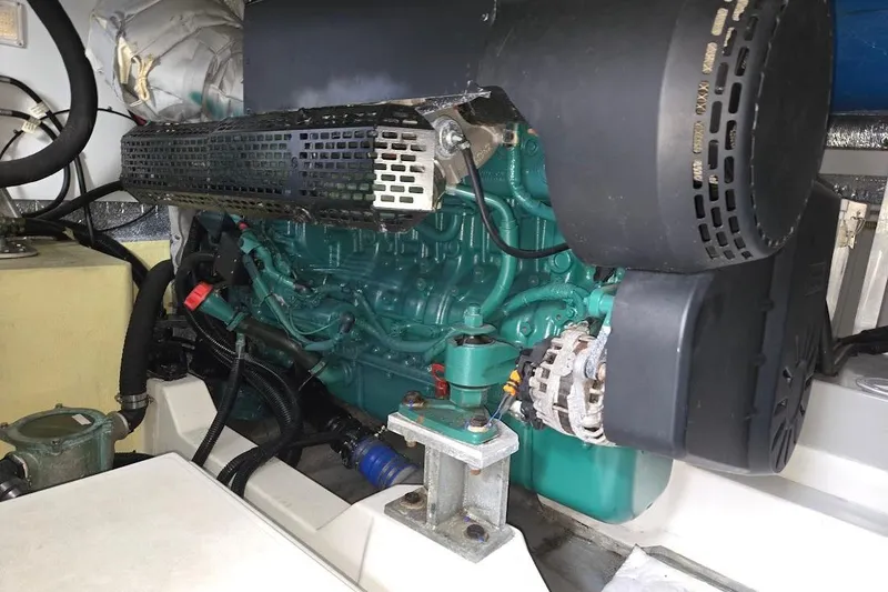 Slide: The Image of Inflatable boat with Honda 20HP motor docked beside Sunseeker Predator 50 yacht. - 65