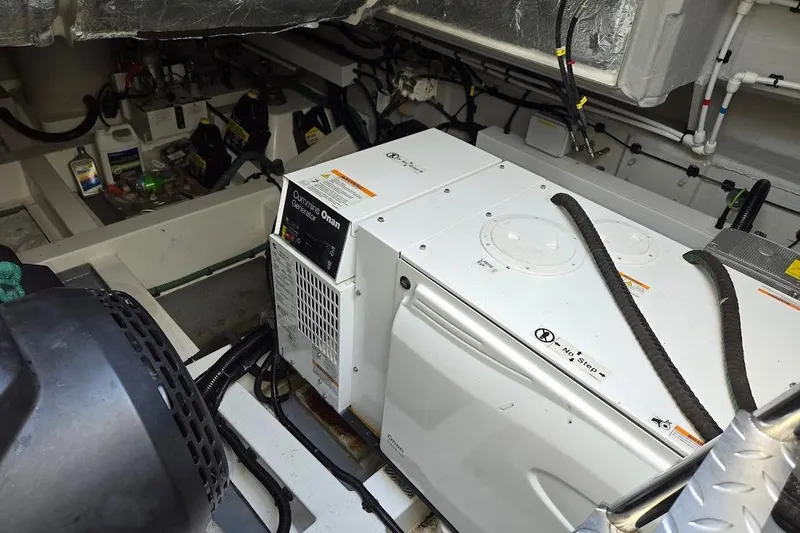 Slide: The Image of Engine compartment of 2019 Sunseeker Predator 50 yacht, showcasing detailed machinery components. - 70