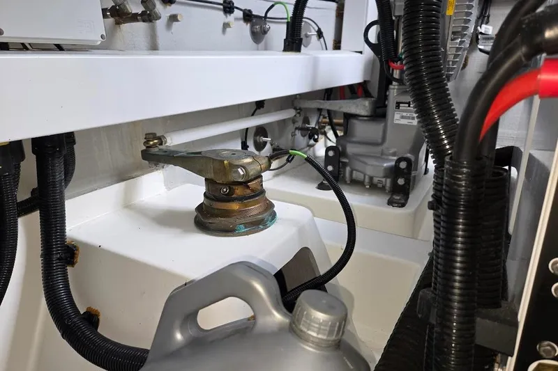 Slide: The Image of Engine compartment of a 2019 Sunseeker Predator 50 yacht, showing wiring and components. - 77