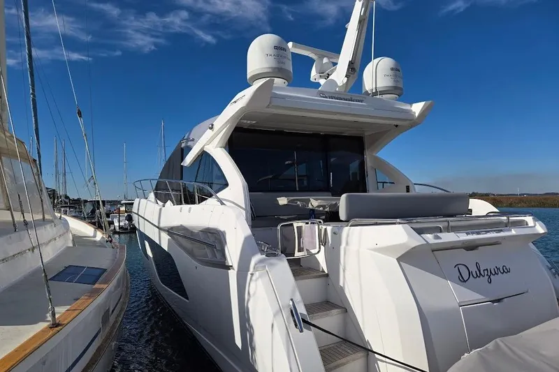 Slide: The Image of Engine compartment of a 2019 Sunseeker Predator 50 yacht, featuring mechanical components. - 80