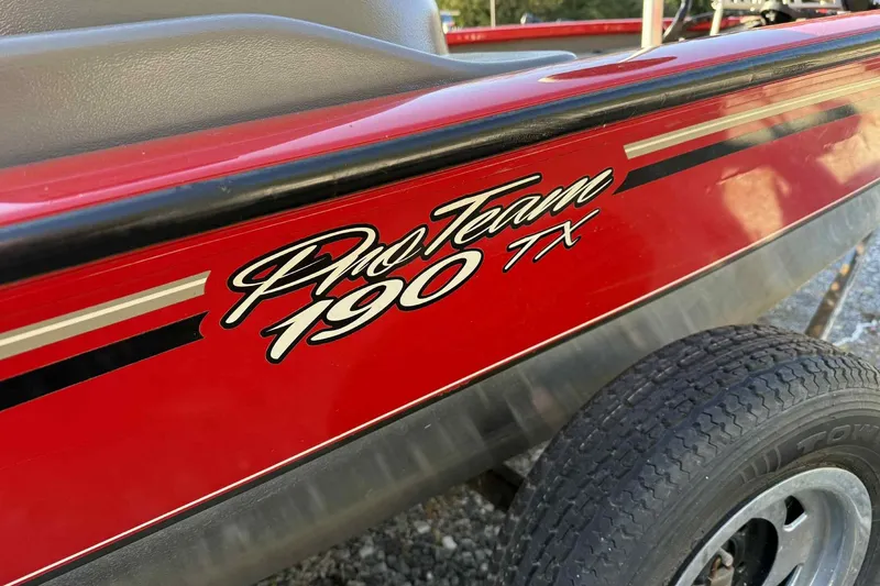 Slide: The Image of 2006 Bass Tracker PT190 Pro Team boat, red exterior with logo detail. - 5