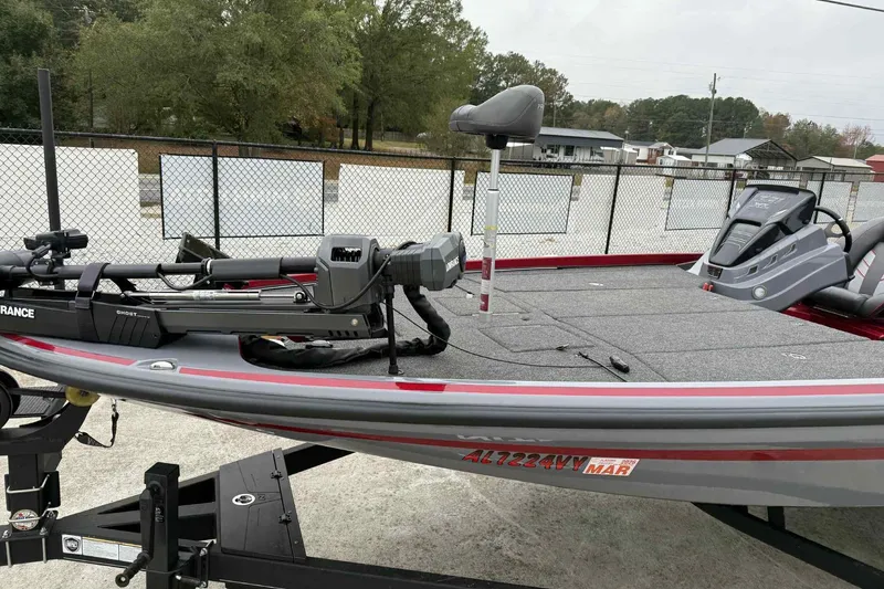 Slide: The Image of 2024 Nitro Z21 XL fishing boat with advanced equipment, parked outdoors. - 3