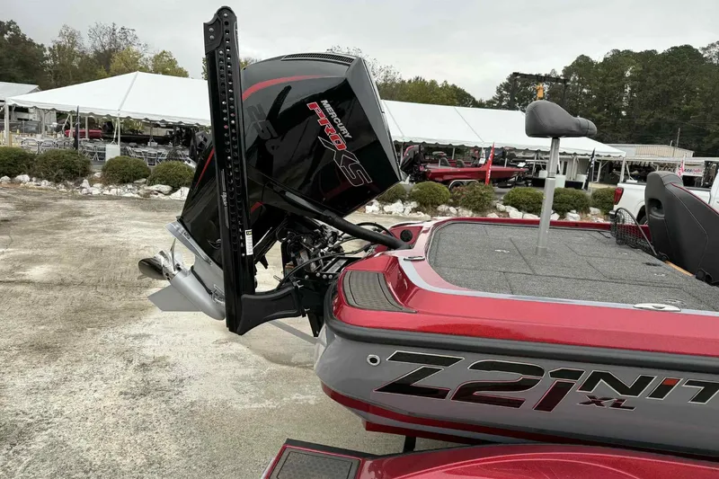 Slide: The Image of 2024 Nitro Z21 XL boat with Mercury Pro XS engine, displayed outdoors. - 5