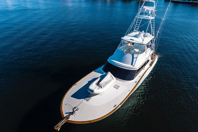 Slide: The Image of Aerial view of 2004 B&D 65 Flybridge yacht on calm water. - 1